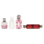 A silver capped, ruby flashed and cut glass scent bottle, c1870, 72mm h, two others, one double