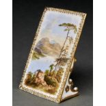 An English porcelain menu tablet, c1880, painted with a named view of Derwent Water in jewelled gilt