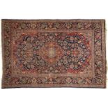 A Kashan rug, second quarter 20th c, 133 x 205cm Fair - good condition with wear at one end