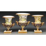 A Miles Mason garniture of three vases, c1810-15, bone china, of campana shape with mask handles,