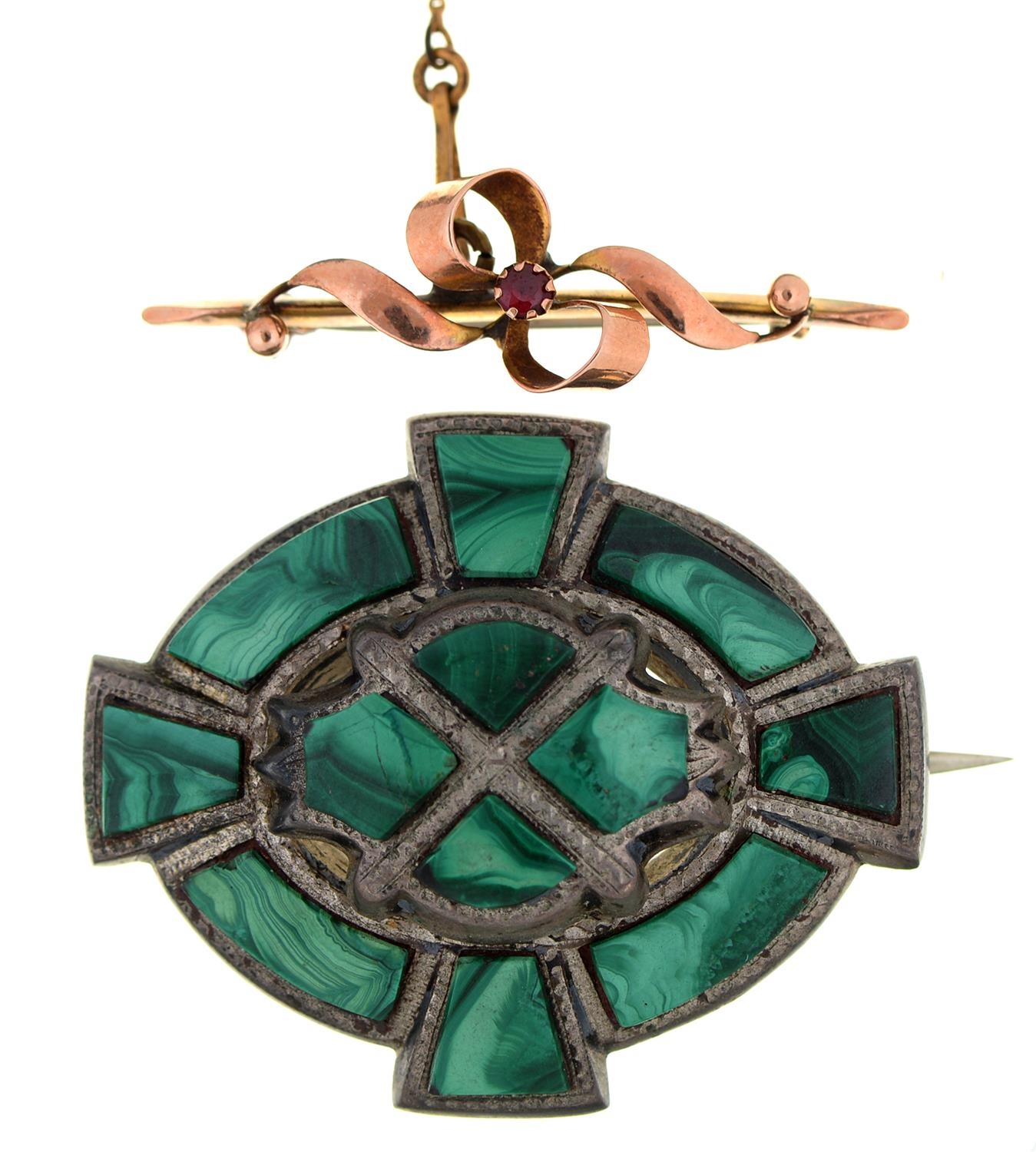 A ruby bow  brooch, in gold, 37mm, indistinctly marked, 2g and a Victorian malachite and silver