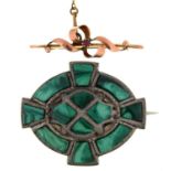 A ruby bow  brooch, in gold, 37mm, indistinctly marked, 2g and a Victorian malachite and silver