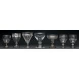 A regency glass rummer, c1810, engraved with festoons, 13cm h, two others, a set of three ogee