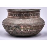 An Islamic tinned copper bowl, Egypt oe Syria, late 19th c, intricately chased in multiple registers