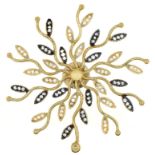 A diamond pendant of radiating leaf design, in gold, 52mm, marked 585, 6.8g Good condition
