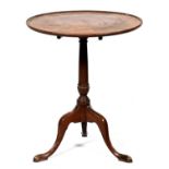 A mahogany tripod table, 20th c, in George III style, with dished top, 73cm h; 61cm diam Good