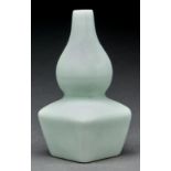 A Chinese pale green monochrome double gourd vase, 14cm h, Kangxi mark Good condition