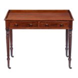An early Victorian mahogany washstand, fitted with two drawers, on tapering turned legs, brass