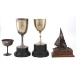 A silver sailing dinghy model racing trophy, set on an oak base, 21cm h, part marked, London, a