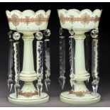 A pair of primrose glass lustres, c1860, with two gilt bands of pearls, 34cm h Condition ReportOne