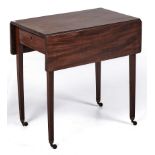 A George III mahogany Pembroke table, fitted with a drawer, on square tapered legs, brass castors,