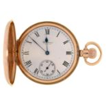 A Waltham 9ct gold keyless lever hunting cased watch, with gold cuvette, 49mm, Birmingham 1927, 92.
