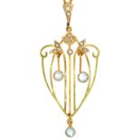 A Jugendstil cornflower blue paste and split pearl openwork pendant, c1910, in gold, 51mm, marked