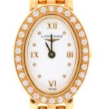 A Longines oval diamond set 18ct lady's wristwatch, ref L61107156, serial No 2984342900, quartz