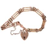 A gold gate bracelet and padlock, 20cm l, marked 9c, 10.5g Condition ReportWear consistent with age