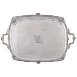 A Sheffield plate tea tray, early 19th c, the gadrooned rim and leafy scrolling handles with
