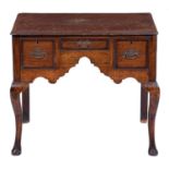 A George III oak and crossbanded lowboy, on cabriole legs, 70cm h; 49.5 x 79cm Condition