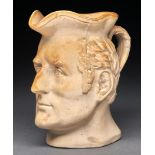 A Stephen Green saltglazed light buff stoneware jug moulded as the head of the Duke of Wellington,