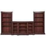 A William IV mahogany breakfront library bookcase, in three sections with brass galleries and a