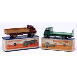 Dinky Toys 513 Guy flat truck with tailboard, two tone green, boxed, VG with wear mainly on cab