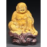 A Chinese straw yellow and aubergine glazed biscuit figure of Budai, on flat unglazed base, 19.5cm h
