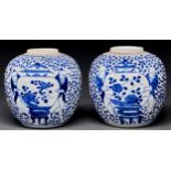 A pair of Chinese blue and white jars, Qing dynasty, 19th c, painted with boys holding a large