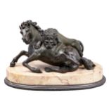 An Italian bronze sculpture of a lion attacking a horse, Rome, c1840, after the antique, on oval