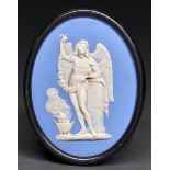 A Wedgwood antique subject jasper ware medallion, 19th c, of a winged youth at a column beside a