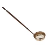A silver punch ladle, the bowl inset with a Charles II threepence, turned mahogany handle, 33cm l