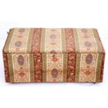 A padded and printed cotton covered Victorian boarded wood ottoman, on later castors, 50cm h; 60 x