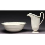 A Wedgwood Queensware chamber jug and bowl, late 19th c, with oak leaf and acorn borders, the jug of