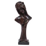 A French Art Nouveau miniature bust of a young woman,  even brown patina, No 4185, on serpentine