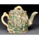 A Staffordshire earthenware rustic teapot and cover, early 19th c, realistically moulded and painted