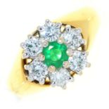 An emerald and diamond cluster ring, in 18ct gold, London 1980, 5.3g, size I Condition ReportGood
