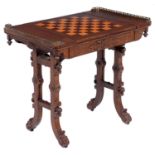 An early Victorian Elizabethan oak games table, the oblong top with brass end-galleries, the