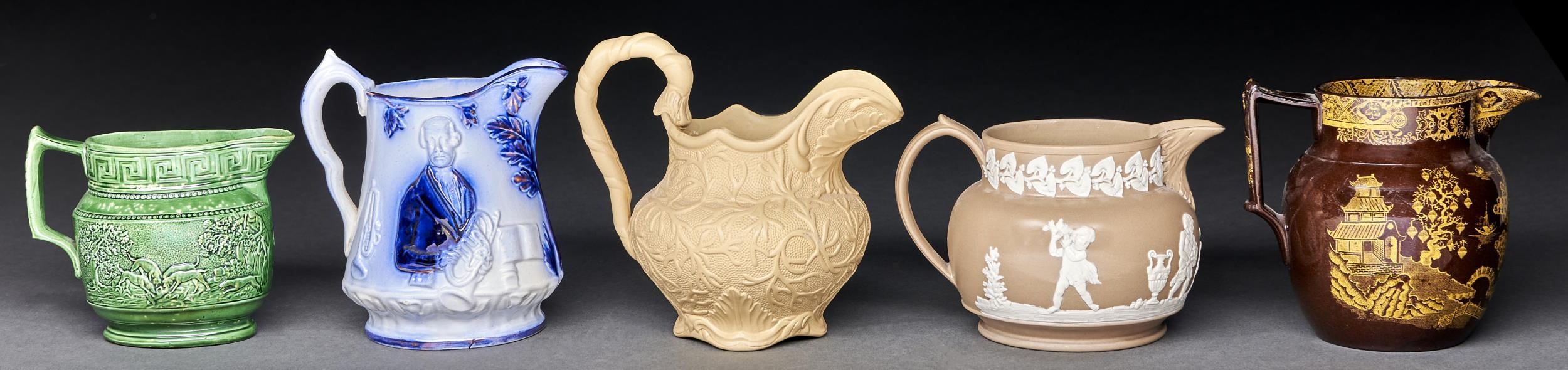A Staffordshire brown glazed pearlware jug, c1830, transfer printed in yellow with a version of