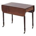 A George IV mahogany Pembroke table, the top line inlaid and fitted with a drawer, on reeded