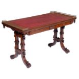 An early Victorian Elizabethan oak writing table, the leather inlet oblong top with pierced brass