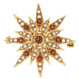 A ruby and split pearl star brooch, in 9ct gold, 32mm, London 1974, 7.4g Condition ReportGood