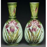 A pair of Victorian cold painted green glass vases, decorated with bearded iris, 36cm h Good