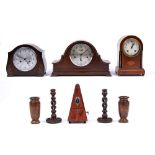 A walnut mantel clock, c1930,  with chiming movement, 23.5cm h, two others, a metronome, pair of