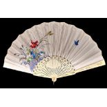 A Victorian fan, the ivory satin leaf painted with a blue butterfly and wild flowers, on carved