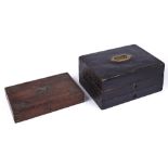 A Victorian writing box, formerly leather covered with fitted interior and folding slope, 36cm l and