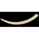 Tribal Art.  A carved ivory tusk, Loango coast, 19th/early 20th c, typically carved with a