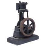 A brass and ferrous metal model stationary steam engine with vertical cylinder, early 20th c,