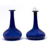 A pair of blue glass mell decanters, c1830, polished pontil scar, 23cm h Good condition