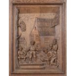 A pair of Northern European oak panels carved with Dutch peasant scenes, early 20th c, in 17th c