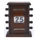 An oak perpetual calendar, c1920,  15.5cm h Good condition