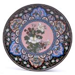 A Japanese cloisonne enamel dish, Meiji period, the central pink ground medallion of flowers in