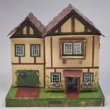 A painted wood twin gabled doll's house, second quarter 20th c, 45cm and a quantity of
